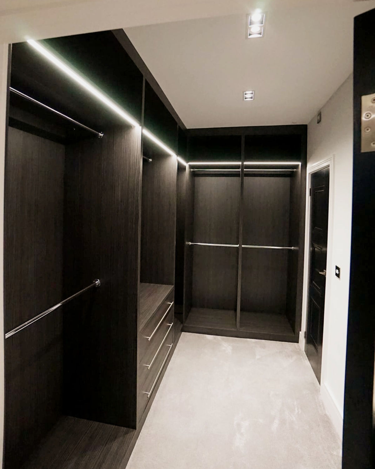 Dark-finish walk-in wardrobe