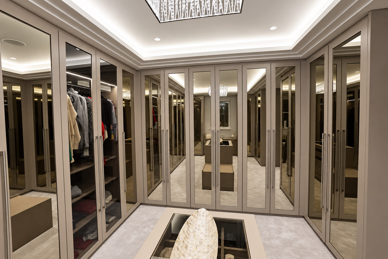 Front wall of a taupe mirrored dressing room